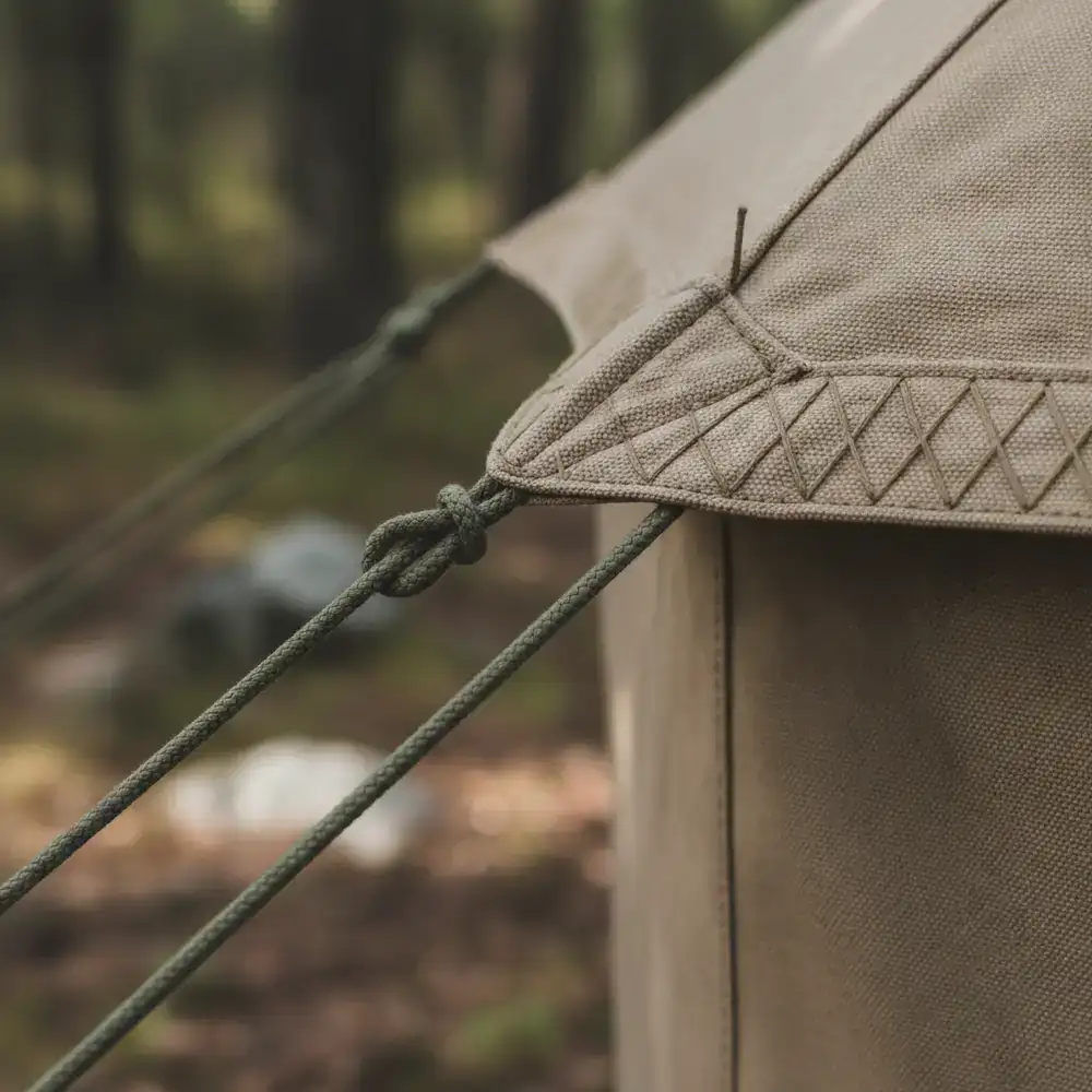 Close up of reinforced tent stitching and guy lines